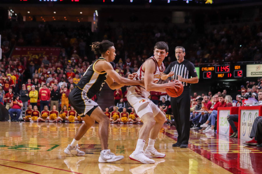 Then-freshman guard Caleb Grill looks for a teammate to pass the ball to during Iowa State’s 73-45 victory over Southern Mississippi on Nov. 19, 2019 at Hilton Coliseum.