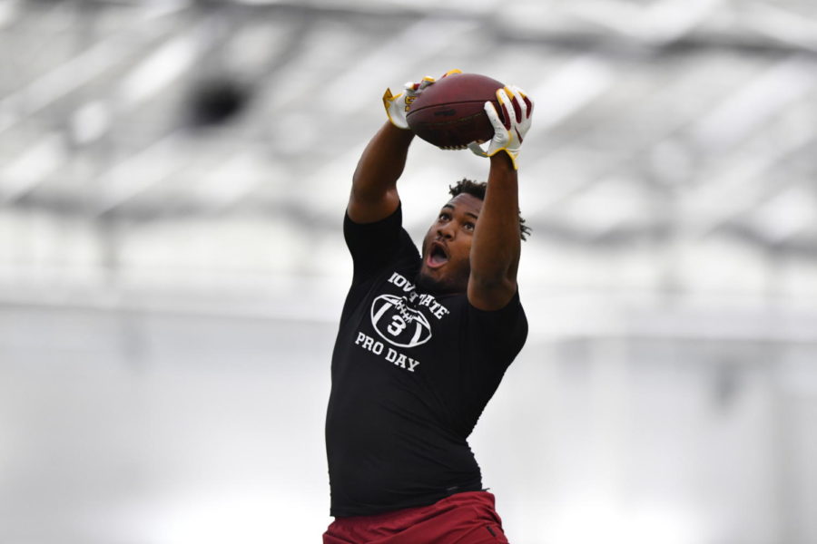Iowa State defensive end JaQuan Bailey catches a football during Pro Day drills March 23 in the Bergstrom Football Complex. 