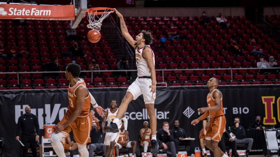 George Conditt IV dunks the ball against the University of Texas on March 2.