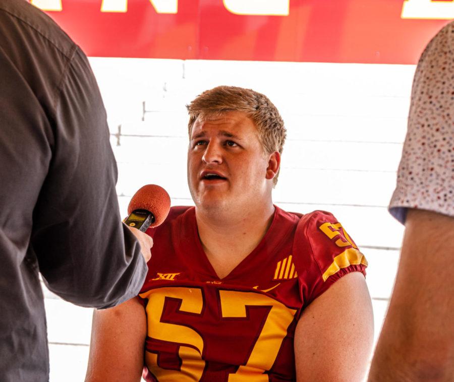 Iowa State offensive lineman Colin Newell talks to reporters during Iowa State media day on August 9.