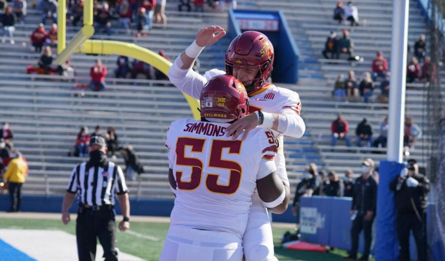 Iowa State quarterback Brock Purdy celebrates with offensive lineman Darrell Simmons Jr. after scoring against the Kansas Jayhawks at David Booth Kansas Memorial Stadium on Oct 31, 2020.