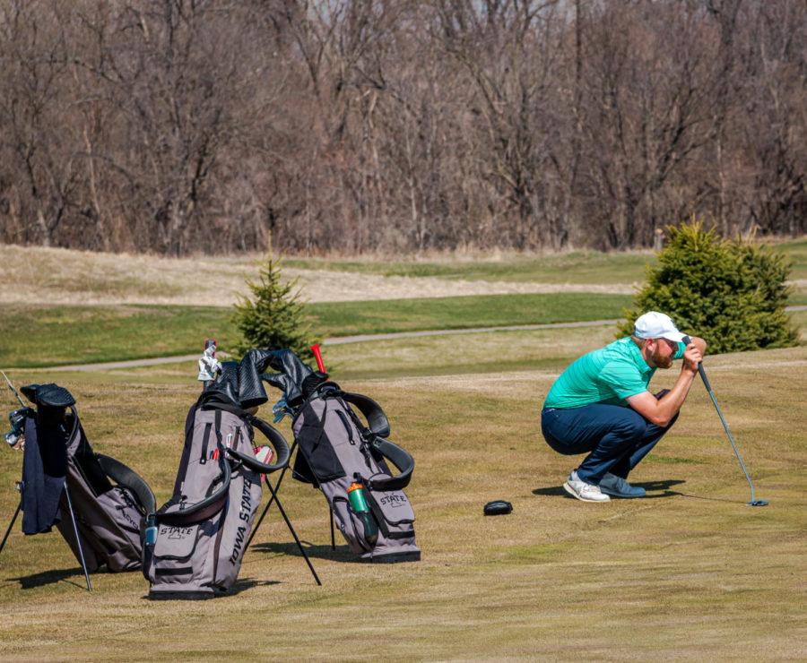 Senior golfer Tripp Kinney lines up his putt at Coldwater Golf Links on April 3.