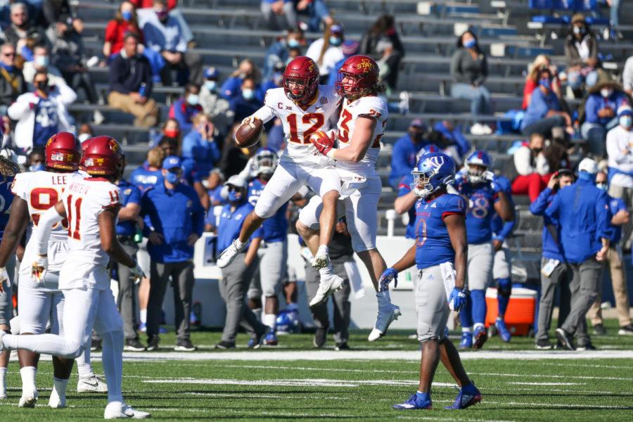 Iowa State defensive back Greg Eisworth II leaps to celebrate with linebacker Mike Rose (right) after Eisworths interception in the third quarter against the Kansas Jayhawks on Oct. 31. 