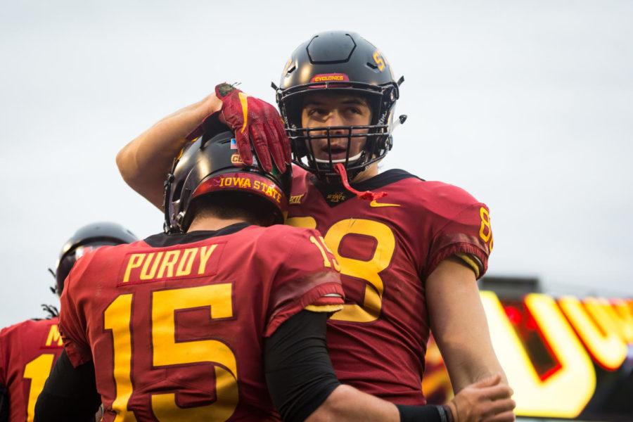 Then-freshman quarterback Brock Purdy and then-redshirt freshman Charlie Kolar celebrate after Purdy ran the ball for a touchdown during the first half of the Iowa State vs. Baylor football game Nov. 10, 2018.