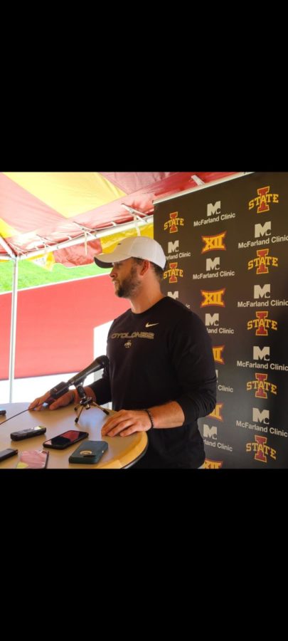 Iowa State tight ends coach Taylor Mouser speaks to the media during Iowa State fall camp on Friday.