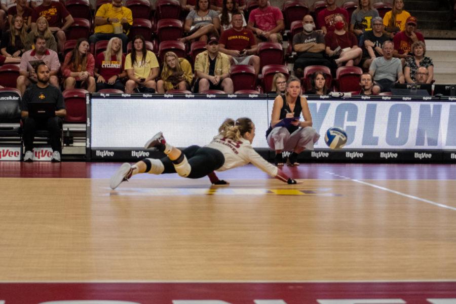 Marija Popovic is seen going for a diving pancake to keep the ball up.
