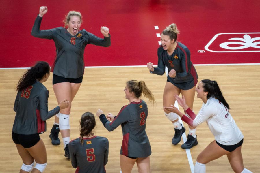 The Iowa State volleyball team celebrates after a point against Texas Tech on Oct. 3, 2020, at Hilton Coliseum.