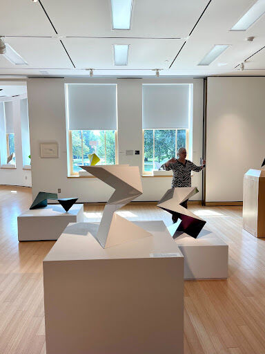 The Charles Ginnever: Folded Forms art exhibit showcases sculptures from multiple perspectives. 