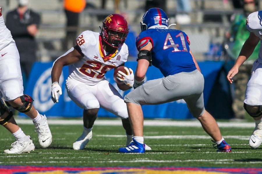 Iowa State running back Breece Hall looks to make a Kansas defender miss Oct. 31. Hall ran for 185 yards and a touchdown in Iowa State's 52-22 win.