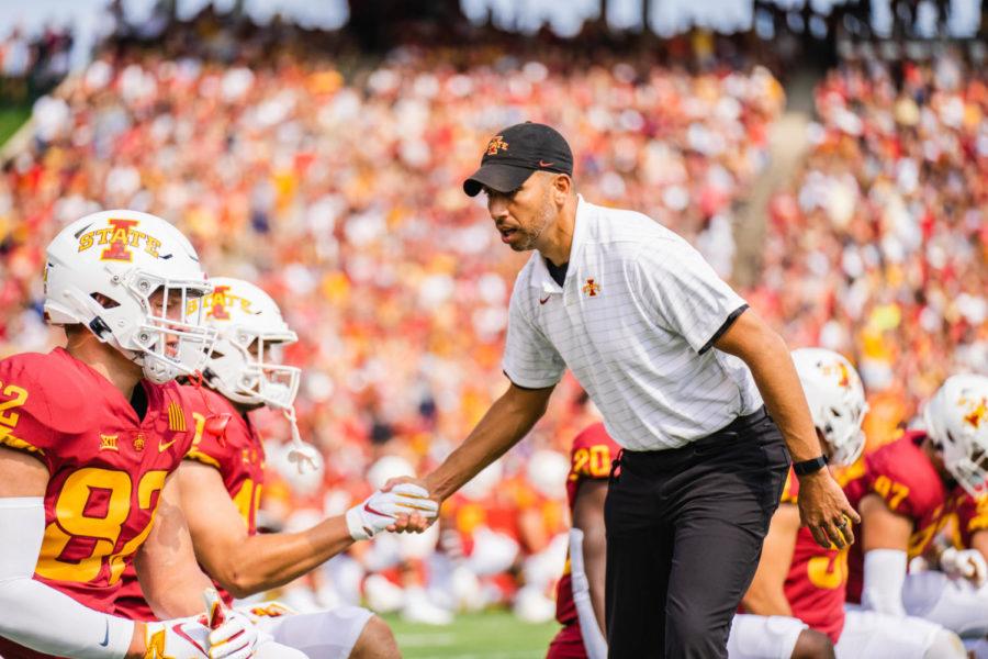 Matt+Campbell+greets+the+Cyclones+during+their+warmups+in+their+season+opener+against+Northern+Iowa+on+Sept.+4.