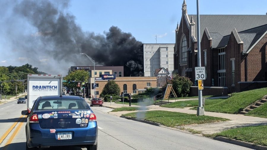 Thick black smoke could be seen in Campustown Wednesday afternoon. Improperly discarded smoking materials ignited a pile of rubber mulch, resulting in the fire and large cloud of smoke. 