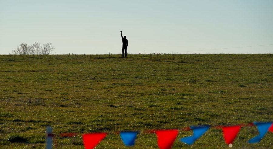 An official stands ready at the Big 12 Cross Country Championships on Oct 30, 2020.(Photo credit: Denny Medley/Random Photography)