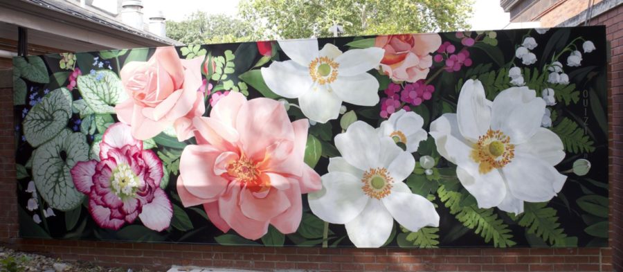 One of two murals painted by Louise Ouizi Jones, the flower-inspired mural is located at Anderson Sculpture Park.