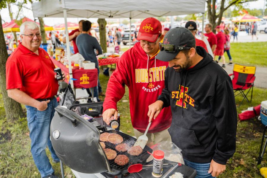 Iowa State fans gather around a grill during a tailgate ahead of the Cyclones season opener on Sept. 4 vs Northern Iowa.