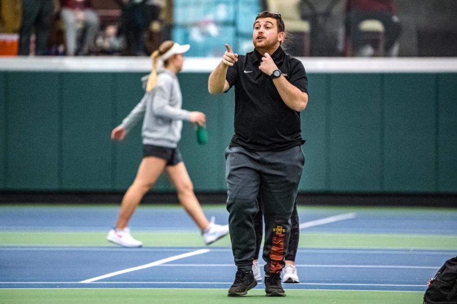 Iowa State tennis head coach walks on the court in the Cyclones match against Marquette on Jan. 24, 2021. 