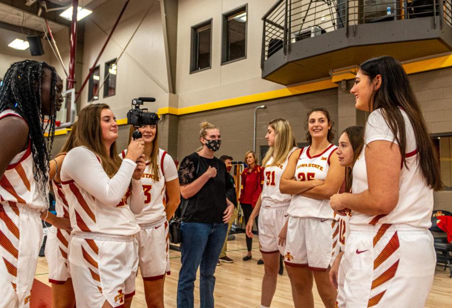 Members of the Iowa State womens basketball team huddle together for a promo video at media day Wednesday.