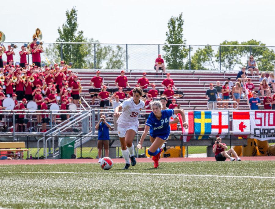 Midfielder Mira Emma dribbles past Drake defender Delaney Goertzen in the second half of Sundays match. The Cyclones were ultimately defeated 2-1 at the Cyclone Sports Complex.