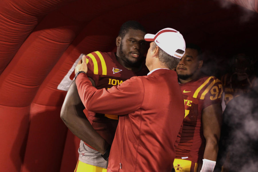 Iowa State Head Coach Paul Rhoads greets his seniors before the Nov. 19, 2011, game against Oklahoma State. Iowa State pulled off the best victory of Rhoads coaching career on that day, defeating the No. 2 Cowboys, 37-31, in double overtime. 