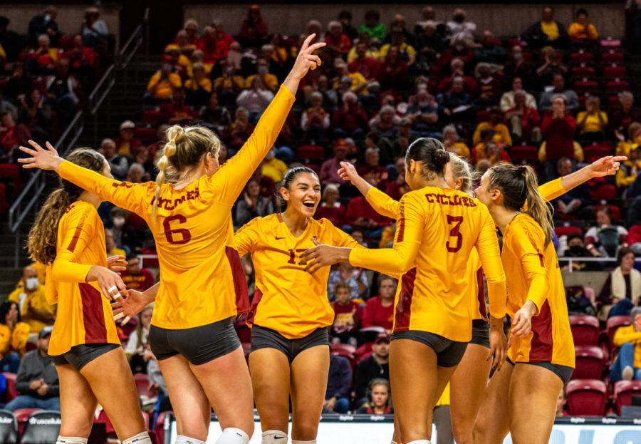 Iowa State volleyball players celebrate a point against No.1 Texas on Oct. 21.
