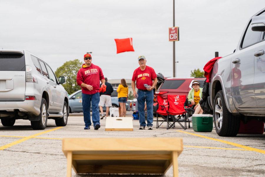 Cyclone fans play bag toss during a tailgate ahead of the Cyclones Sept. 4 season opener vs Northern Iowa.