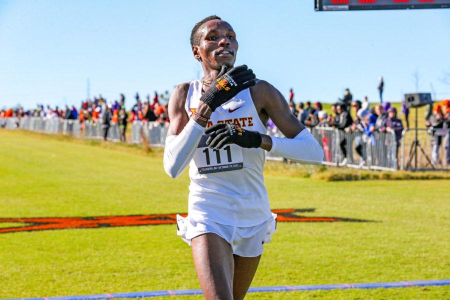 Wesley+Kiptoo+crosses+the+finish+line+after+winning+the+individual+title+at+the+2021+Big+12+Mens+Cross+Country+Championship+on+Oct.+29+in+Stillwater%2C+Oklahoma.