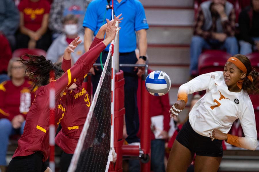 Iowa States Candelaria Herrera and Annie Hatch block a kill attempt against No.1 Texas on Oct. 22. (Photo courtesy of Wesley Winterink/Iowa State Athletics)