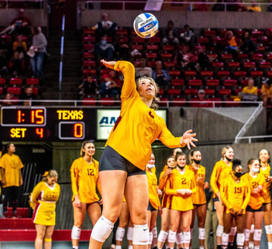 Iowa State senior Eleanor Holthaus serves against No.1 Texas on Oct.21. The Cyclones lost 3-1 to the Longhorns.