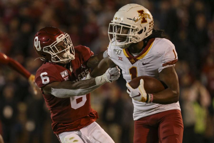 Then-redshirt+sophomore+Tarique+Milton+runs+past+his+defender+during+the+game+against+Oklahoma+on+Nov.+9%2C+2019.+The+Cyclones+lost+to+the+Sooners+42-41.