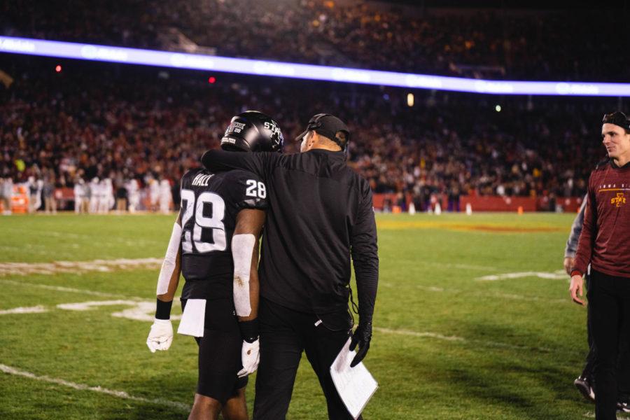 Matt Campbell talks with Breece Hall on the sideline during the Cyclones' 48-14 win over TCU on Nov. 26.