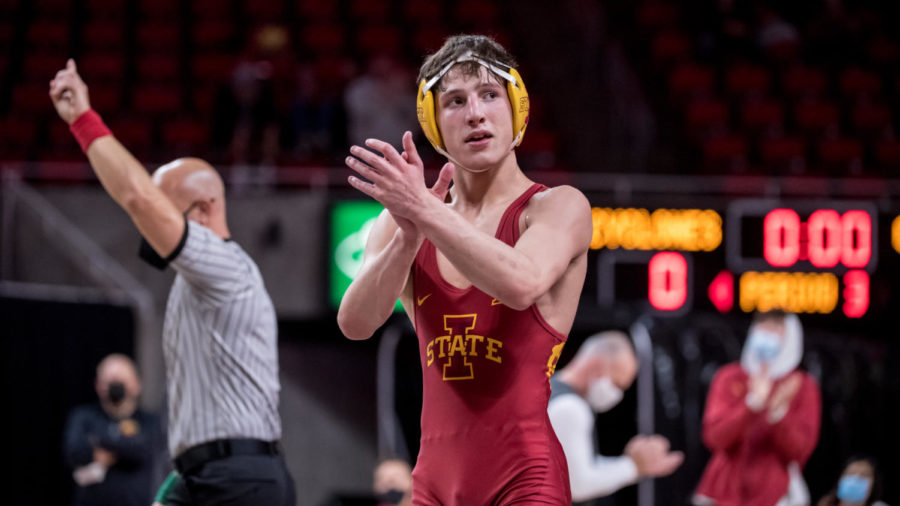 Then-freshman Zach Redding celebrates after winning his dual against Oklahoma States Reece Witcraft 6-0 on Jan. 30, 2020.