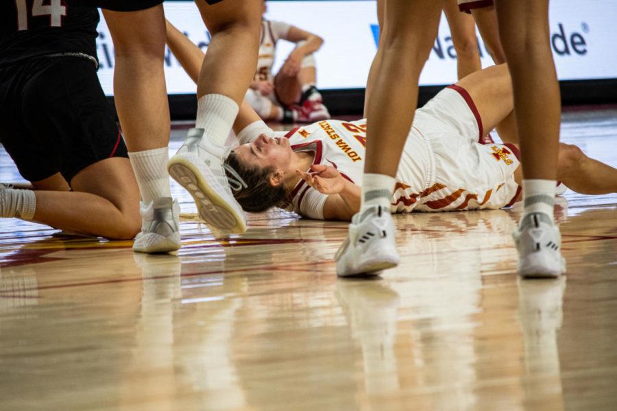 Iowa State freshman forward Maggie Vick lands on the ground after attempting a layup against Omaha on Nov. 9. in Hilton Coliseum.