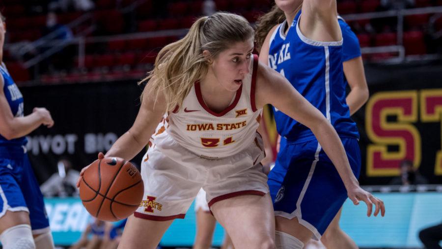 Iowa State redshirt sophomore Morgan Kane backs her way into the post against Drake University during a 85-67 win Dec. 22 in Hilton Coliseum.
