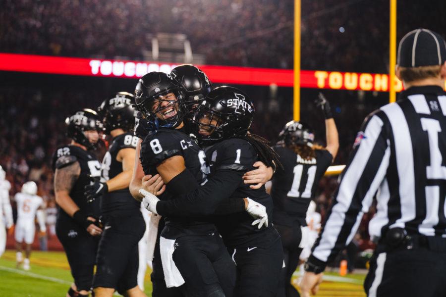 Xavier+Hutchinson+and+Tarique+Milton+celebrate+a+successful+trick+play+in+the+third+quarter+of+Iowa+States+30-7+victory+over+Texas+at+Jack+Trice+Stadium.