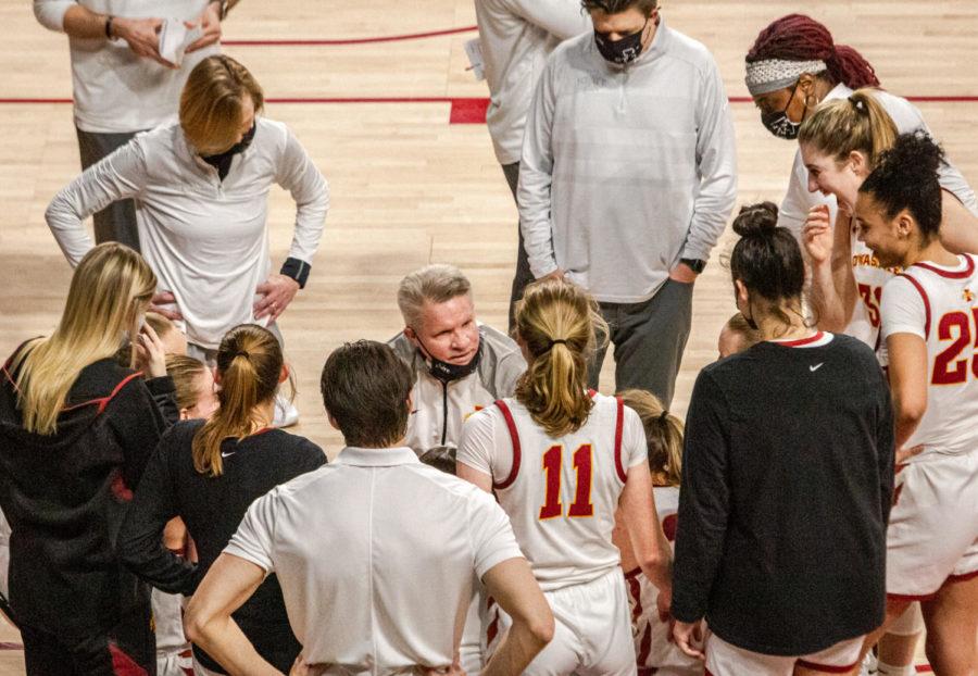 Head Coach Bill Fennelly talks to the Cyclones during a timeout in the second half against West Virginia on Feb. 24 at Hilton Coliseum. 