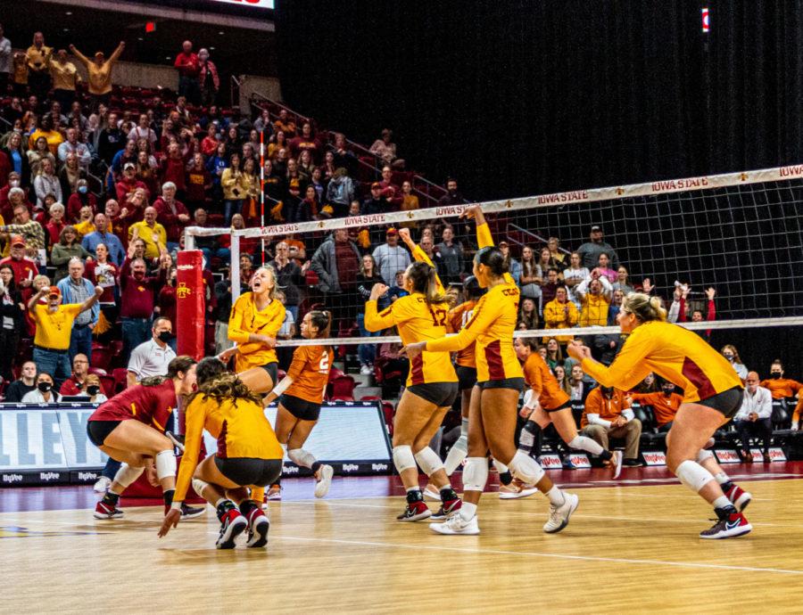 Iowa+State+volleyball+players+celebrate+after+securing+a+point+against+No.+1+Texas+on+Oct.+21.