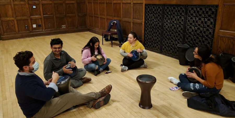 Several students gathered to learn how to play a Darbuka drum at the Open Spaces event Oct. 26 in the Great Hall. 