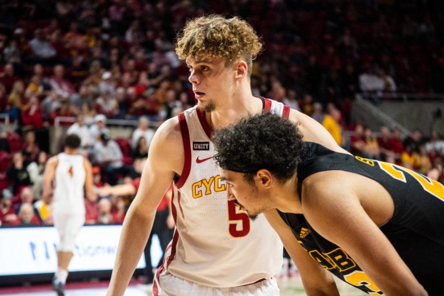 Aljaz Kunc gets close and defends an Arkansas Pine-Bluff player as they try to put the ball in play Dec. 1 in Hilton Coliseum.