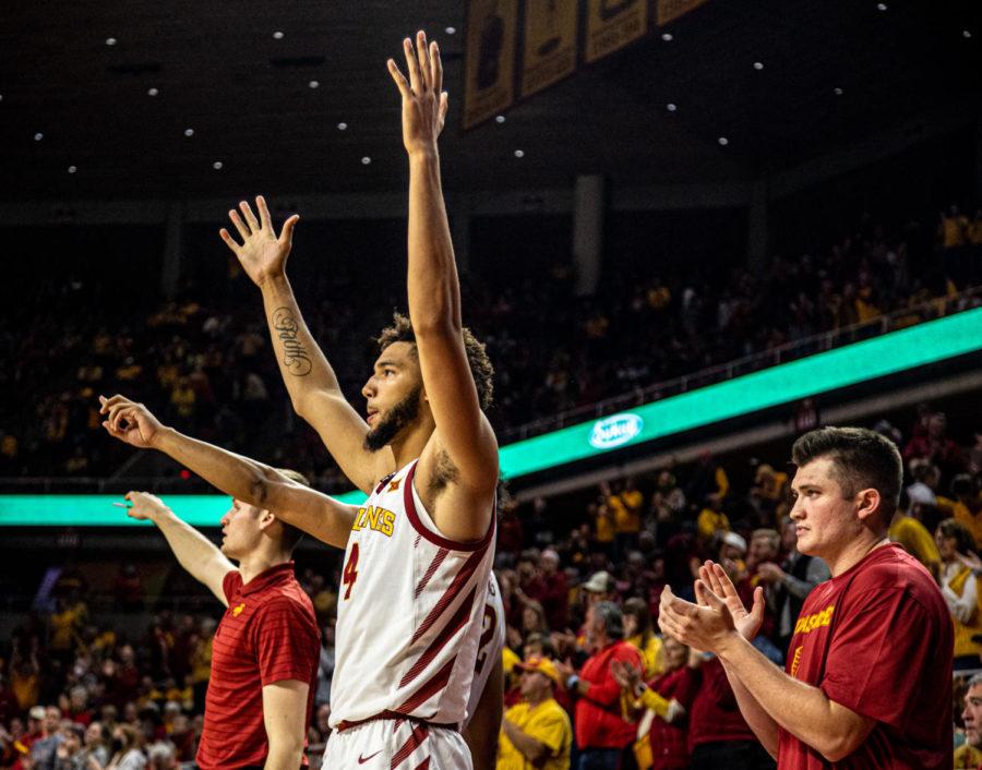 George Conditt and teammates celebrate on the bench after the Cyclones score against Oregon State on Nov. 12.
