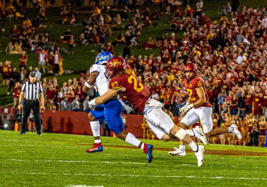 Iowa State linebacker Mike Rose tackles Kansas wide receiver Trevor Wilson in the Cyclones' game against Kansas on Oct. 2, 2021.