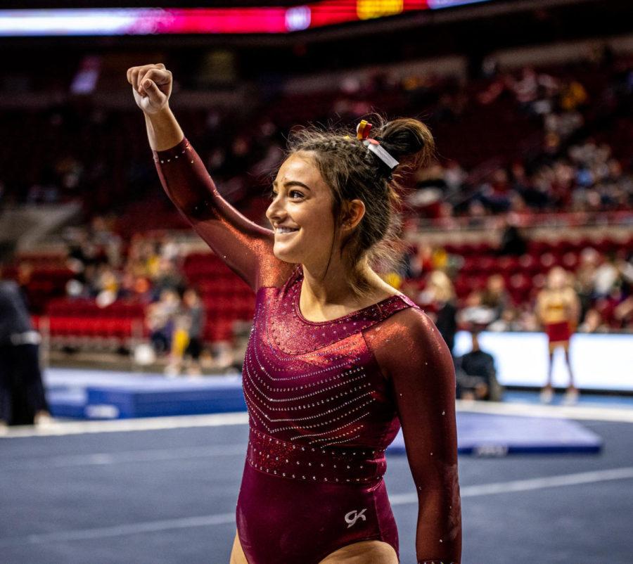 Iowa State junior Maddie Diab celebrates after the floor exercise in the Cyclones gymnastics meet against the University of Nebraska on Jan. 7.