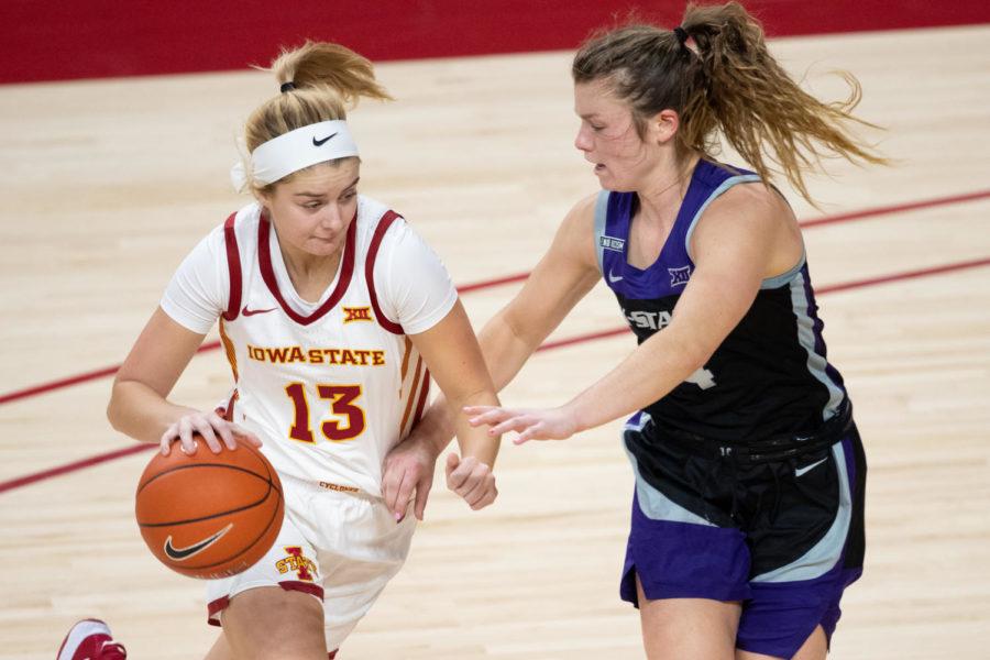 Iowa State sophomore guard Maggie Espenmiller-Mcgraw tries to score against Kansas State on Dec 18 in Hilton Coliseum. Espenmiller-McGraw made her 2020-21 season debut against the Wildcats with 14 points.