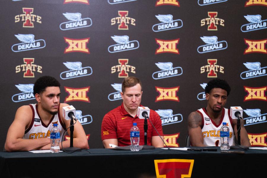 Tristan Enaruna (left), T.J. Otzelberger and Izaiah Brockington (right) take questions from the media after losing to No. 1 Baylor 77-72 on Saturday.