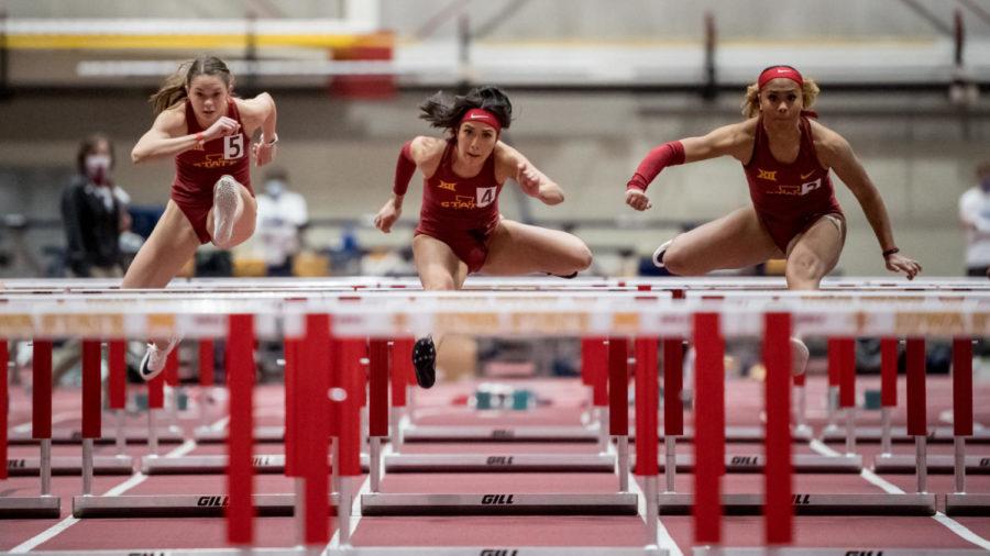 Kaylyn Hall (left), Katarina Vlahovic (middle) and Tatiana Aholou (right) compete in the womens 60-meter hurdles at the Cyclone Invite on Jan. 23, 2021.