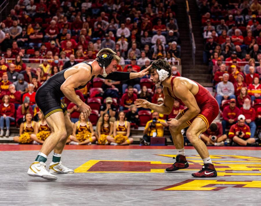 Ian Parker wrestles against Iowas Max Murin in the Cyclones dual No. 1 Iowa on Dec 5. 