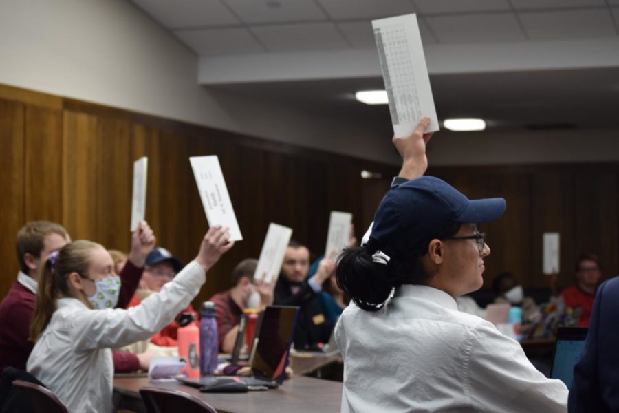 The Student Government Senate voting during a weekly meeting at the Memorial Union on Wednesday. 