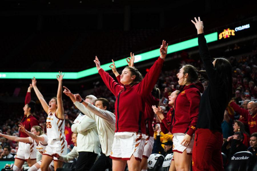 Iowa State womens basketball players celebrate on the bench after a Cyclone three-pointer in Iowa States 70-55 win over Kansas State on Feb. 2.