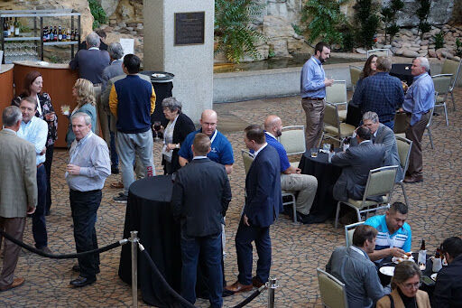 Photo of attendees socializing during a previous Egg Issues Forum.