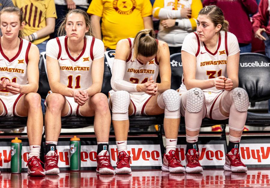 (From left to right:) Emily Ryan, Ashley Joens and Morgan Kane sit on the bench during the Cyclones 87-62 loss to No.5 Baylor on Feb. 28 in Hilton Coliseum.