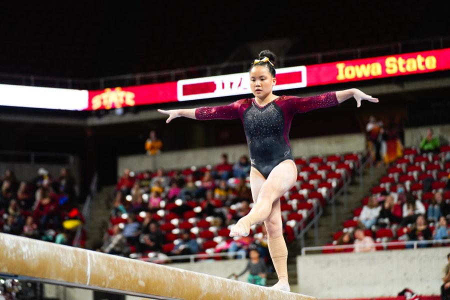 Iowa State freshman Hannah Loyim does her routine on the balance beam in the Cyclones gymnastics meet against the University of West Virginia on Jan. 28.