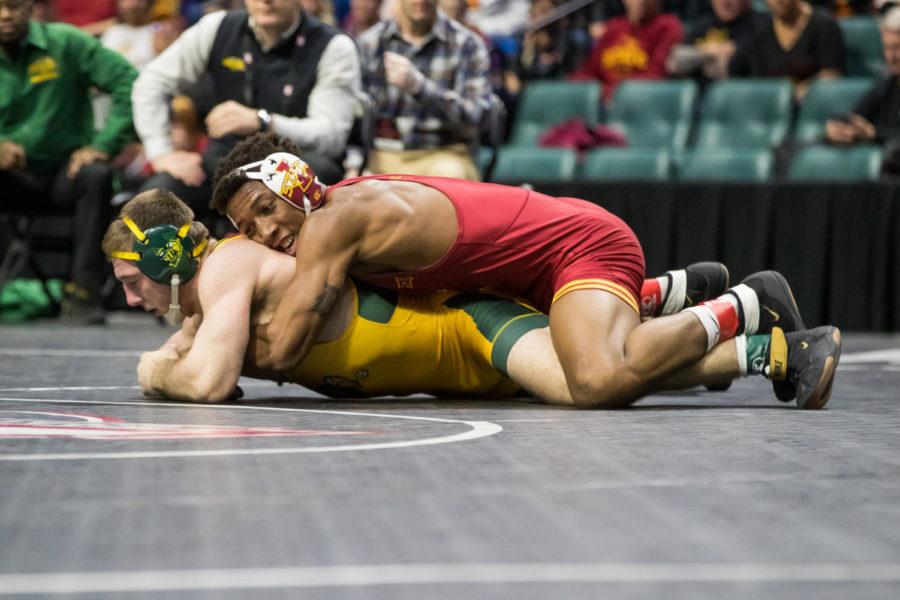 David+Carr+faces+North+Dakota+States+Jared+Franek+at+the+Big+12+Wrestling+Championship+on+March+6+in+Tulsa%2C+OK.+Carr+defeated+Franek+8-2+to+win+his+third+Big+12+title.+%28Brett+Rojo%2FBig+12+Conference%29